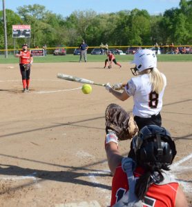 Sydney Yoho takes aim at a pitch from Caldwell’s Reagan Wheeler during Monroe Central’s sectional matchup with Caldwell Monday, May 6 at Woodsfield.