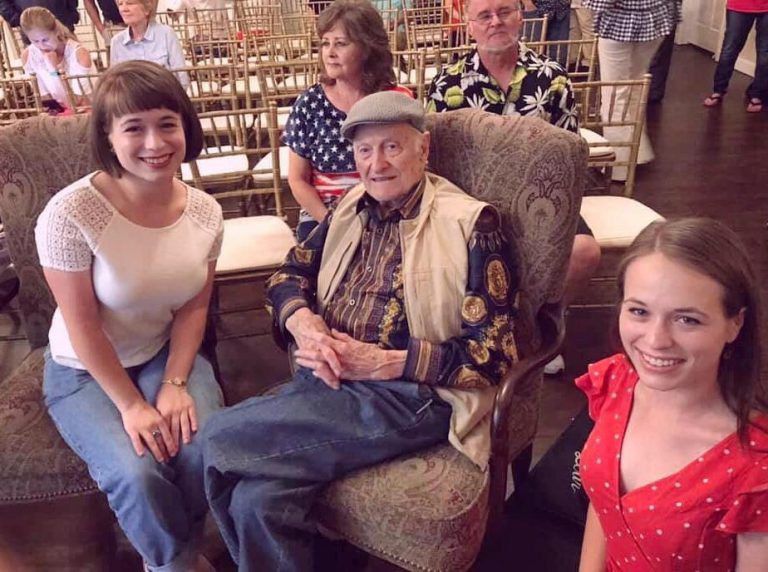 Leanna Price, left, and Lauren Price Napier, right, wishing Jesse McReynolds, center, a happy 90th birthday.