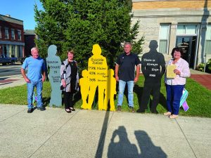 commissioners_with_depressing_standees_web